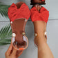 Elegante Sandalen mit Knöchelriemen und Perlen.